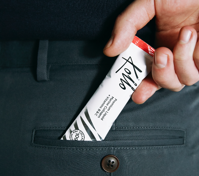 Photo of a Kollo Premium Liquid marine collagen in a pocket